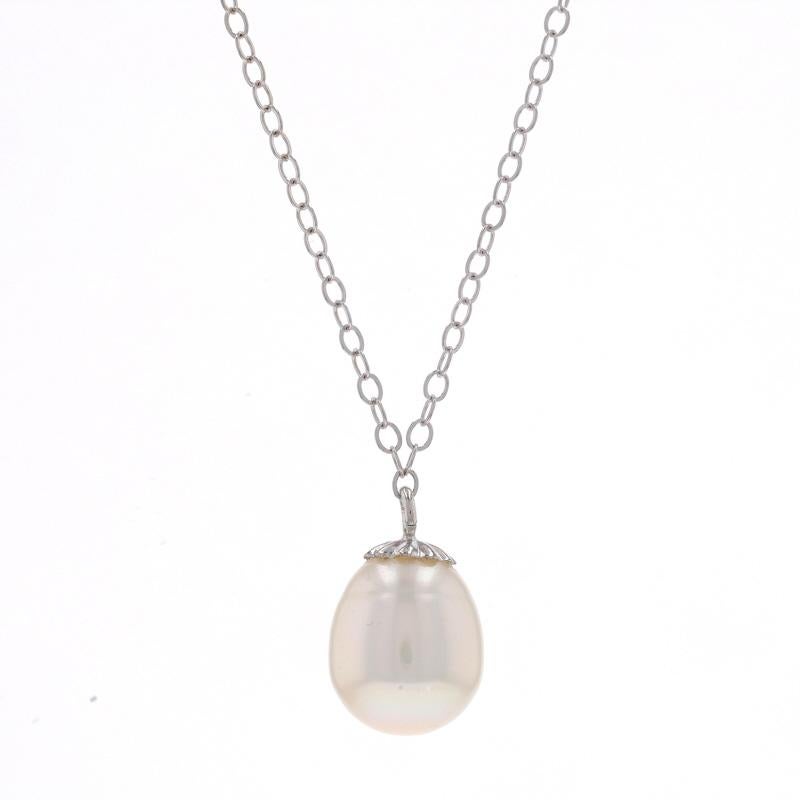 Metal Content: 14k White Gold

Stone Information
Cultured Pearl
Color: White

Style: Solitaire
Chain Style: Flat Cable
Necklace Style: Chain
Fastening Type: Spring Ring Clasp

Measurements

Item 1: Attached Pendant
Tall (from stationary bail):