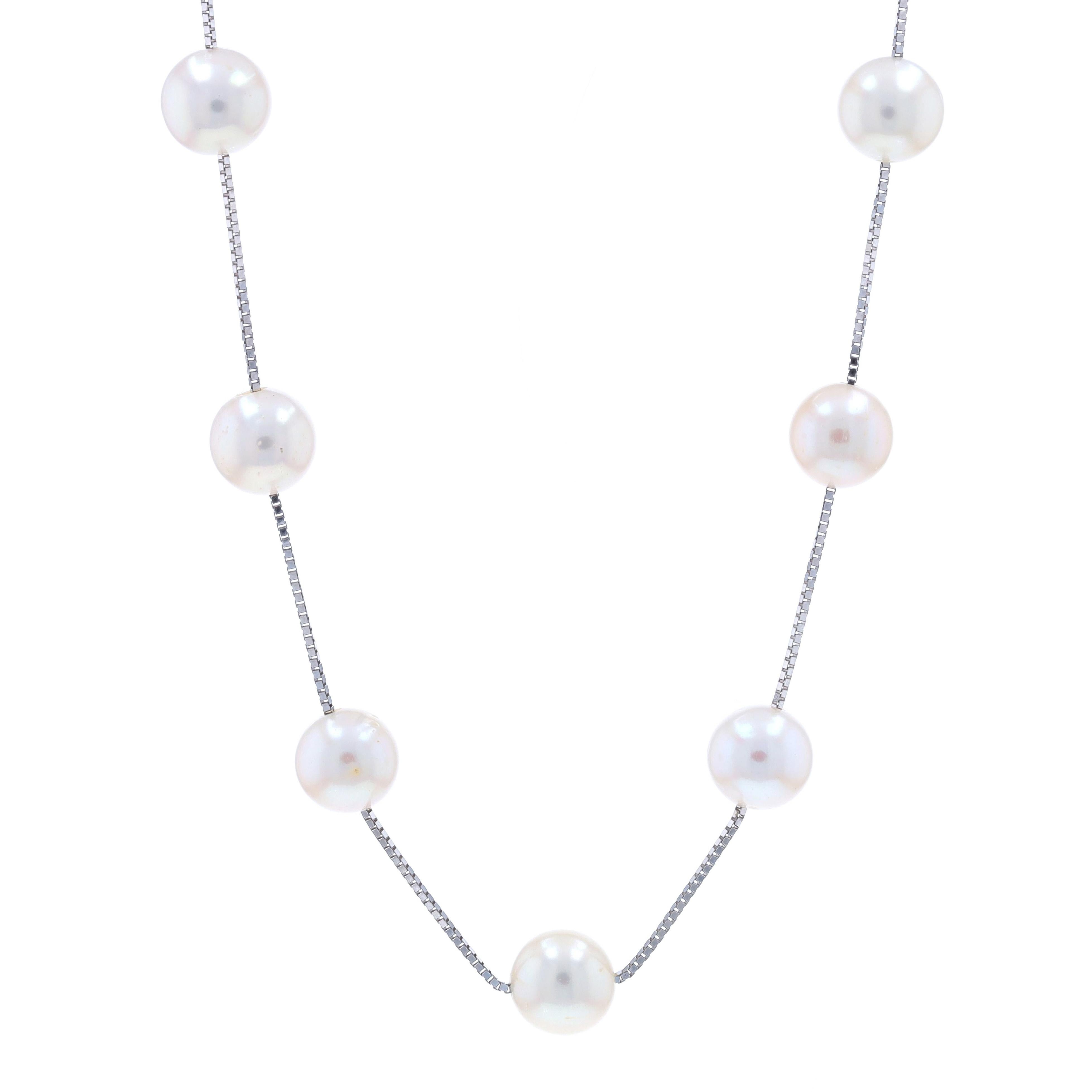 Metal Content: 14k White Gold

Stone Information

Cultured Pearls
Color: White
Size: 8.6mm - 9.0mm

Chain Style: Box
Necklace Style: Chain Station
Fastening Type: Lobster Claw Clasp

Measurements

Chain Width: 1/16