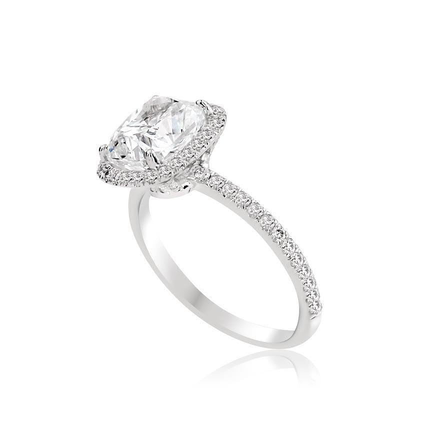 
White Gold Cushion Cut Ring set with Side Diamonds - 3.51 ct
Set in 18K White gold

Total diamond weight: 3.01
[ 1 diamond ] 
Color: E 
Clarity: VS 

Total side diamond weight: 0.50 ct 
Color: G-H 
Clarity: VS 