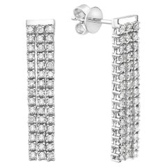 Boucles d'oreilles pendantes en or blanc et en diamant