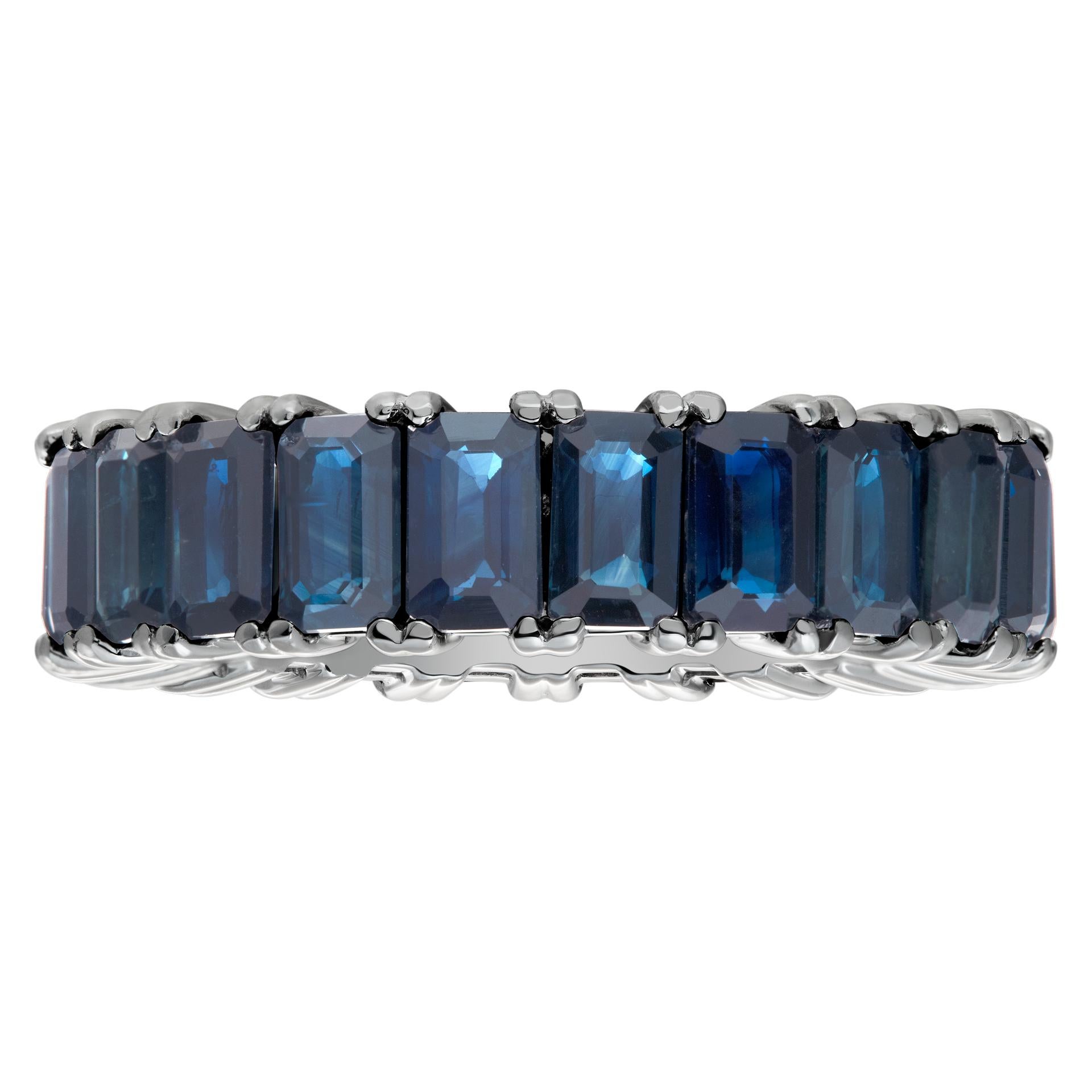 Dark blue sapphire eternity band in 14k white gold with 7.85 carats in rectangular cut blue sapphires. Size 7
