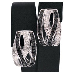 Used White Gold Design Earrings with White and Black Brilliant Diamonds