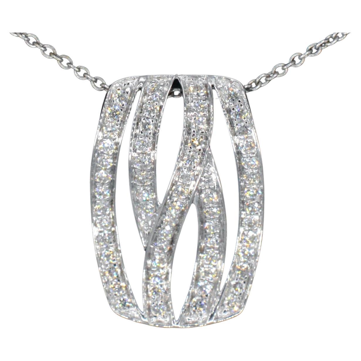 This white gold pendant is a stunning piece of jewelry that features brilliant-cut diamonds in a modern and sophisticated design. The diamonds are expertly set in the white gold to create a seamless and elegant look that is perfect for any occasion.