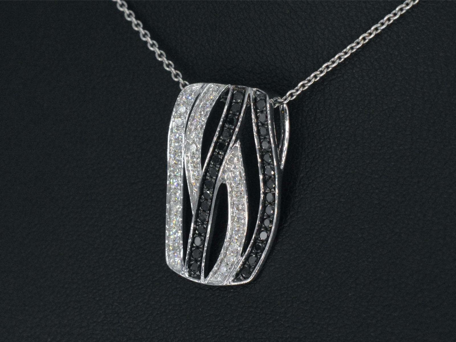 Contemporary White Gold Design Pendant with White and Black Brilliant Diamonds