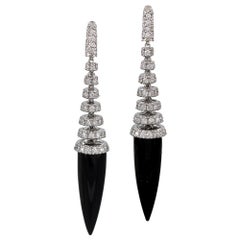 White Gold, Diamond and Black Onyx Torpedo Earrings