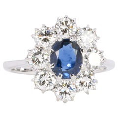 White gold diamond and blue sapphire cluster ring