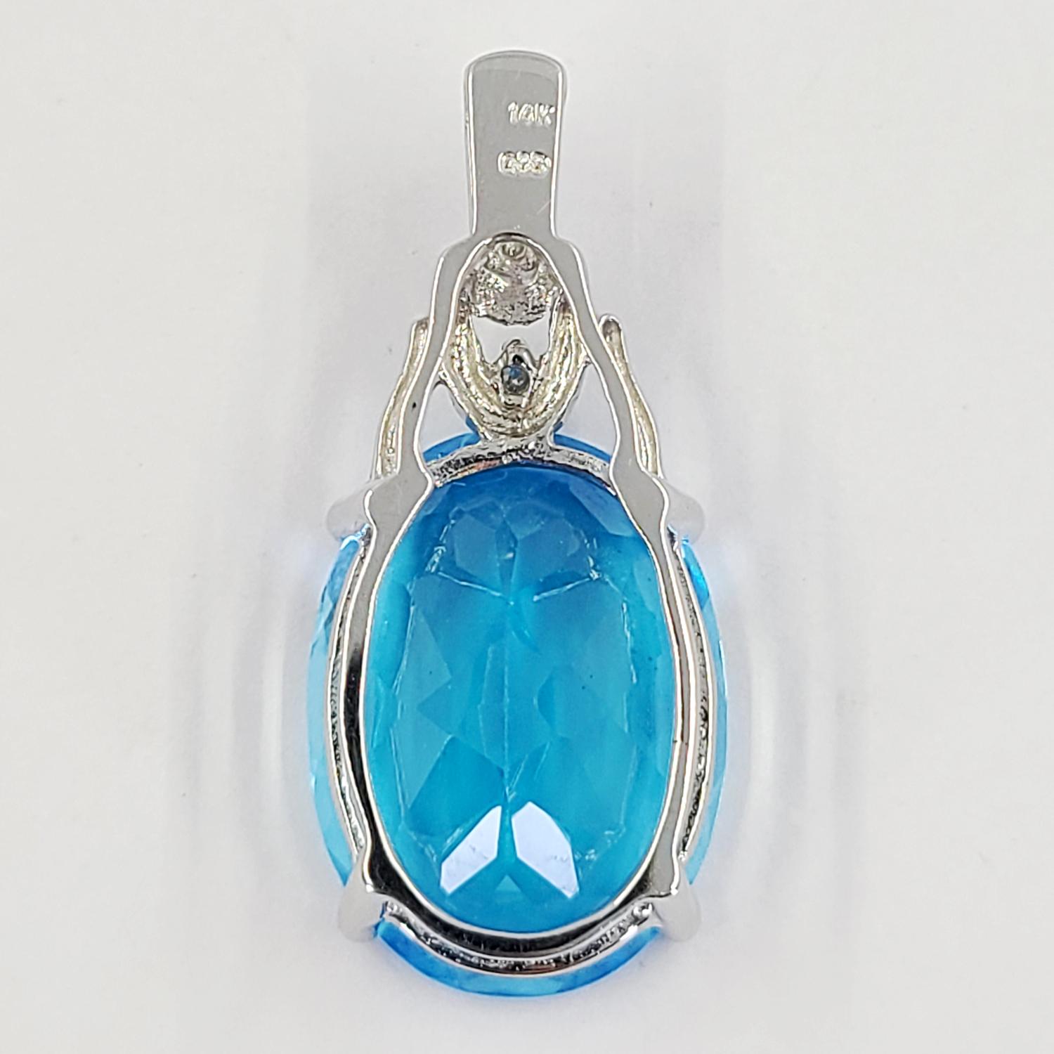 White Gold, Diamond, and Oval Blue Topaz Pendant In Good Condition In Coral Gables, FL