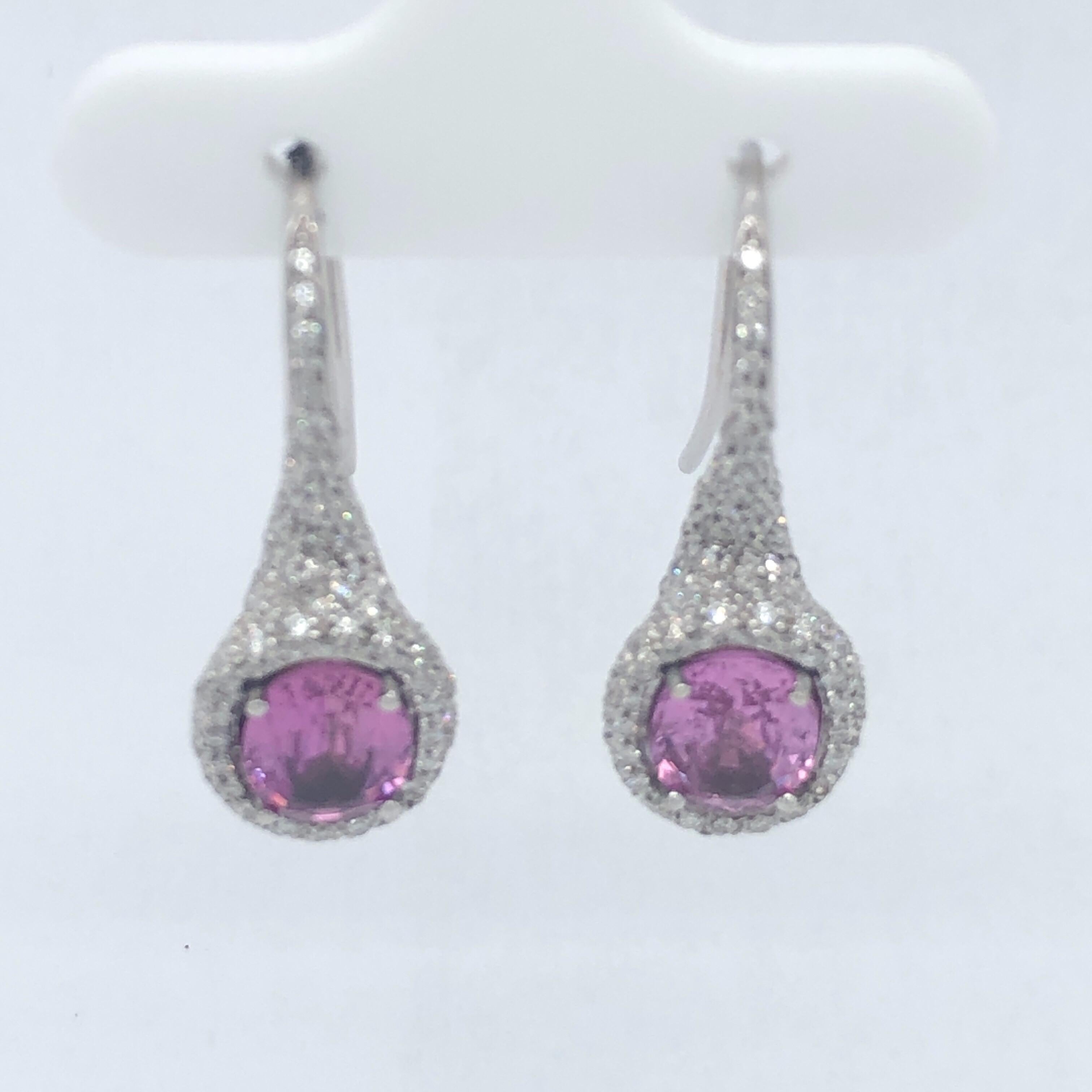 Stunning 18K White Gold Diamond and Pink Sapphire Earrings from World Renowned Designer, Chantelcer.  Stamped Chantecler and 750.  
