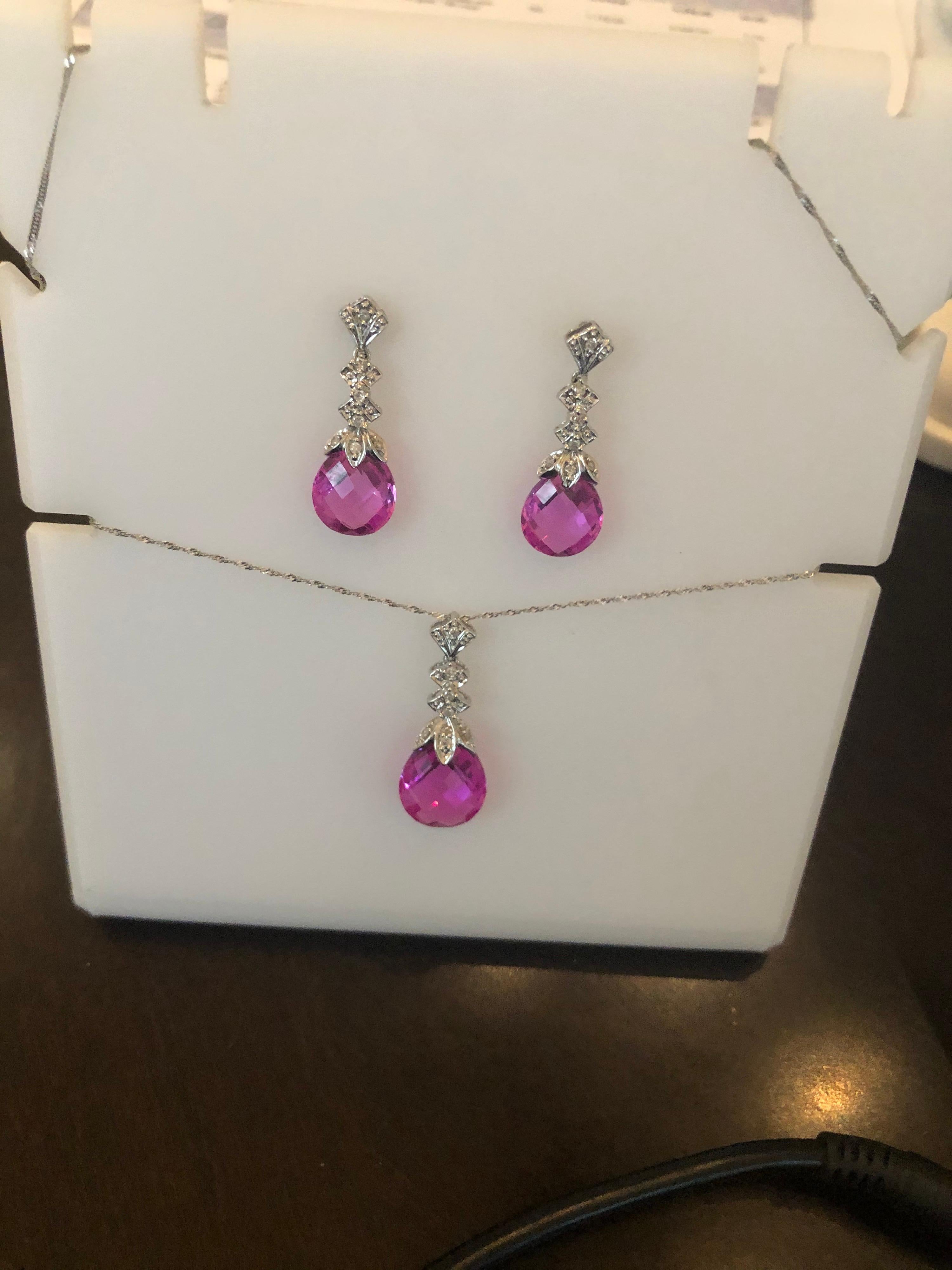 Sweet Pink!  10 karat white gold dangle earrings with Diamonds and Pink Stones paired with matching pendant on chain.   This fabulous set is gorgeous and fun.  A big look for a little bit! For pierced ears earrings hang 1 inch long and pendant is 1