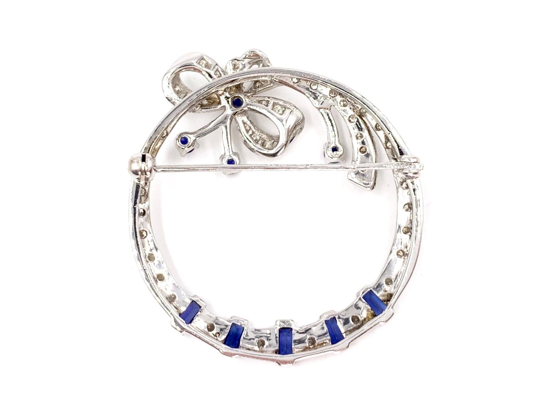 White Gold Diamond and Sapphire Circle Bow Brooch In Good Condition For Sale In Pikesville, MD