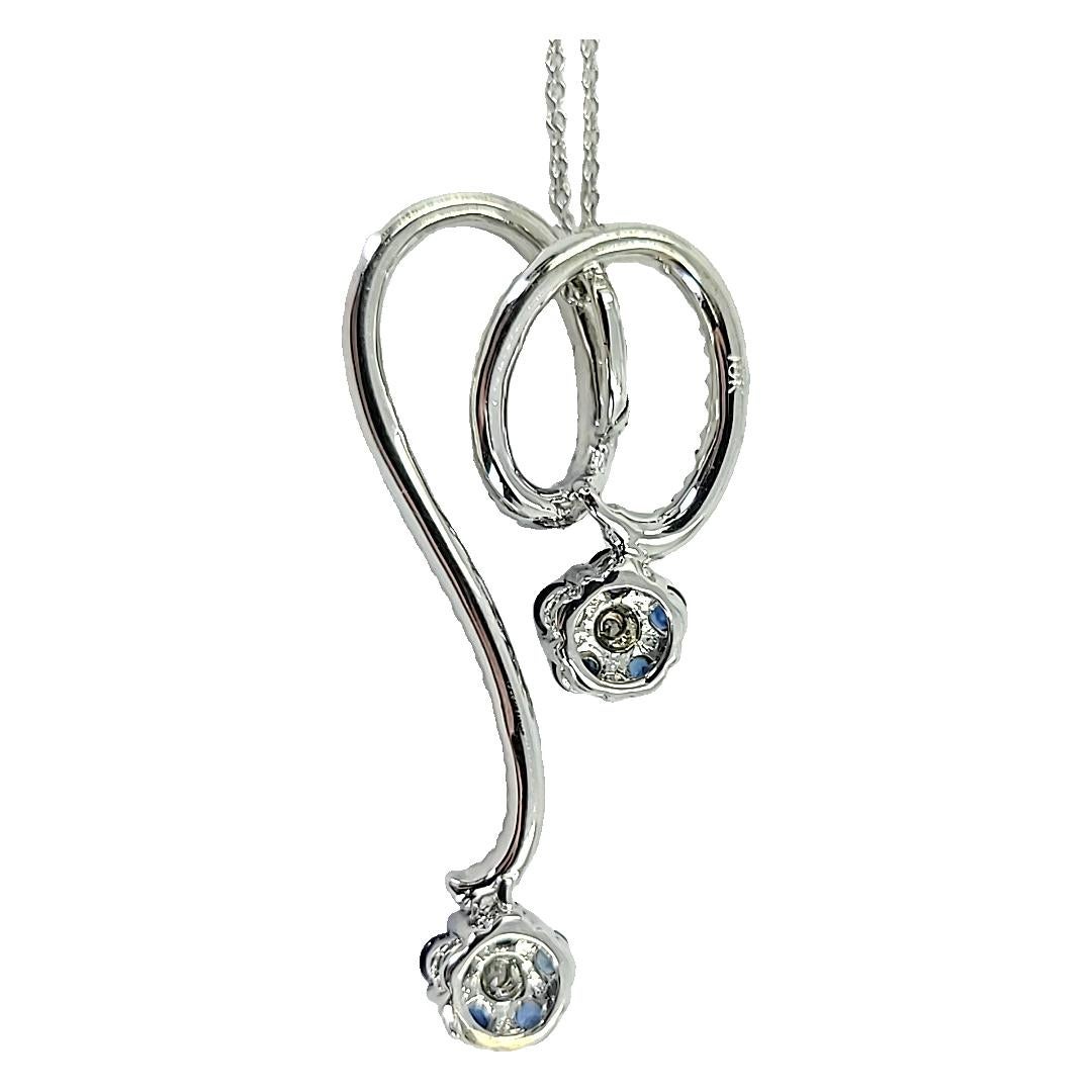 White Gold, Diamond, and Sapphire Flower Drop Pendant In Good Condition In Coral Gables, FL