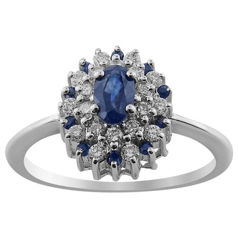 Oval Cut White Gold Diamond and Sapphire Ring For Sale