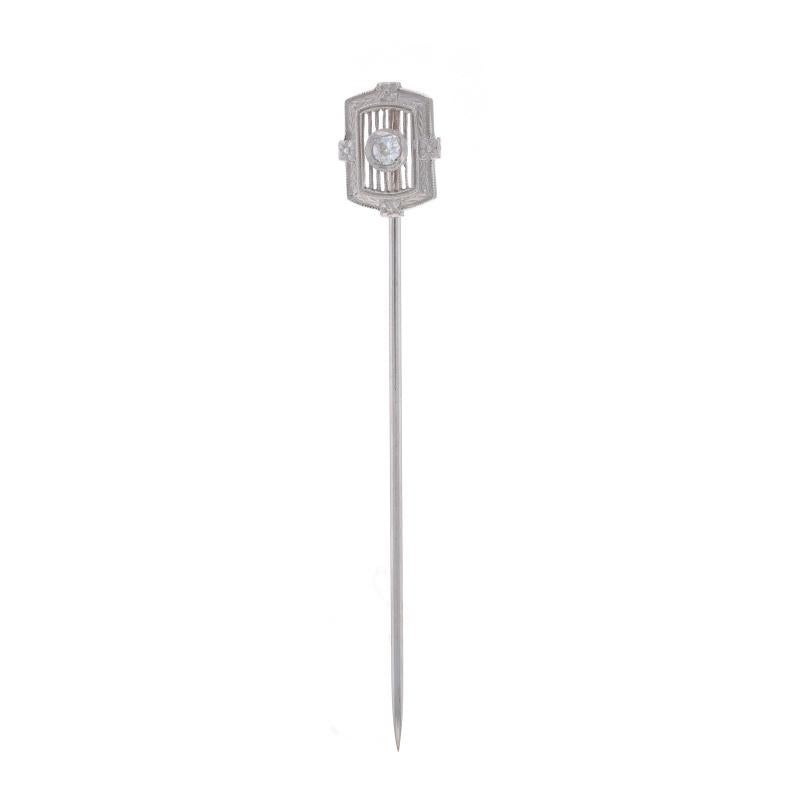 Era: Art Deco
Date: 1920s - 1930s

Metal Content: 14k White Gold

Stone Information

Natural Diamond
Carat(s): .08ct
Cut: Mine
Color: J
Clarity: SI1

Style: Solitaire Stickpin
Theme: Floral
Features: Etched & Milgrain Detailing

Measurements

Face