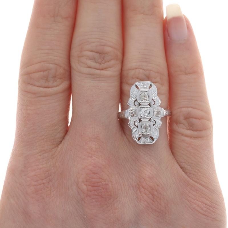 Size: 8
Sizing Fee: Up 2 sizes for $35 or Down 2 sizes for $35

Era: Art Deco
Date: 1920s - 1930s

Metal Content: 14k White Gold

Stone Information

Natural Diamonds
Carat(s): .55ctw
Cut: Mine
Color: H - I - J
Clarity: SI1 - I1

Total Carats: