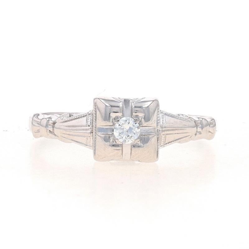 Size: 6
Sizing Fee: Up 2 sizes for $35 or Down 2 sizes for $30

Era: Art Deco
Date: 1920s - 1930s

Metal Content: 14k White Gold

Stone Information

Natural Diamond
Carat(s): .06ct
Cut: European
Color: I
Clarity: VS2

Style: Solitaire
Features: