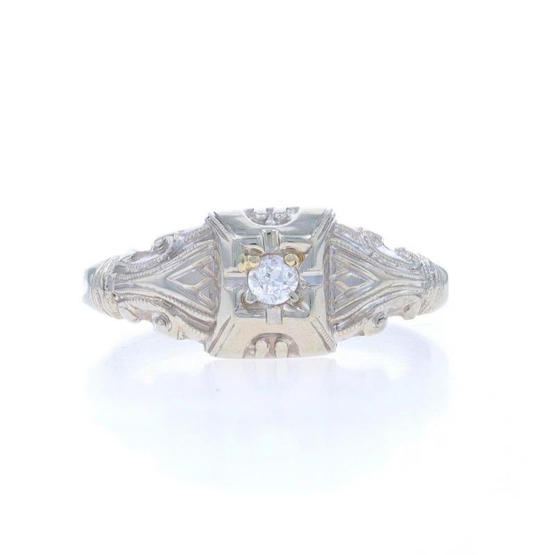 Size: 4 1/2
Sizing Fee: Up 2 sizes for $40 or Down 1 size for $30

Era: Art Deco
Date: 1920s - 1930s

Metal Content: 18k White Gold

Stone Information

Natural Diamond
Carat(s): .06ct
Cut: European
Color: H
Clarity: VS2

Style: Solitaire
Features: