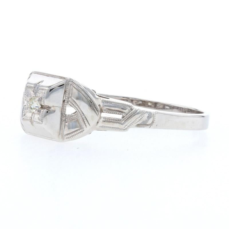 Size: 6
Sizing Fee: Down 2 sizes for $20 or Up 2 sizes for $25

Era: Art Deco 1920s - 1930s

Metal Content: 14k White Gold

Stone Information: 
Natural Diamond
Carat: .03ct
Cut: Single 
Color: VS1
Clarity: L

Style: Solitaire 
Features: Milgrain