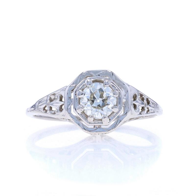 Size: 5 3/4
Sizing Fee: Up 2 sizes for $50 or Down 1 size for $40

Era: Art Deco
Date: 1920s - 1930s

Metal Content: 18k White Gold

Stone Information

Natural Diamond
Carat(s): .50ct
Cut: European
Color: J
Clarity: VS1

Total Carats: .50ct

Style: