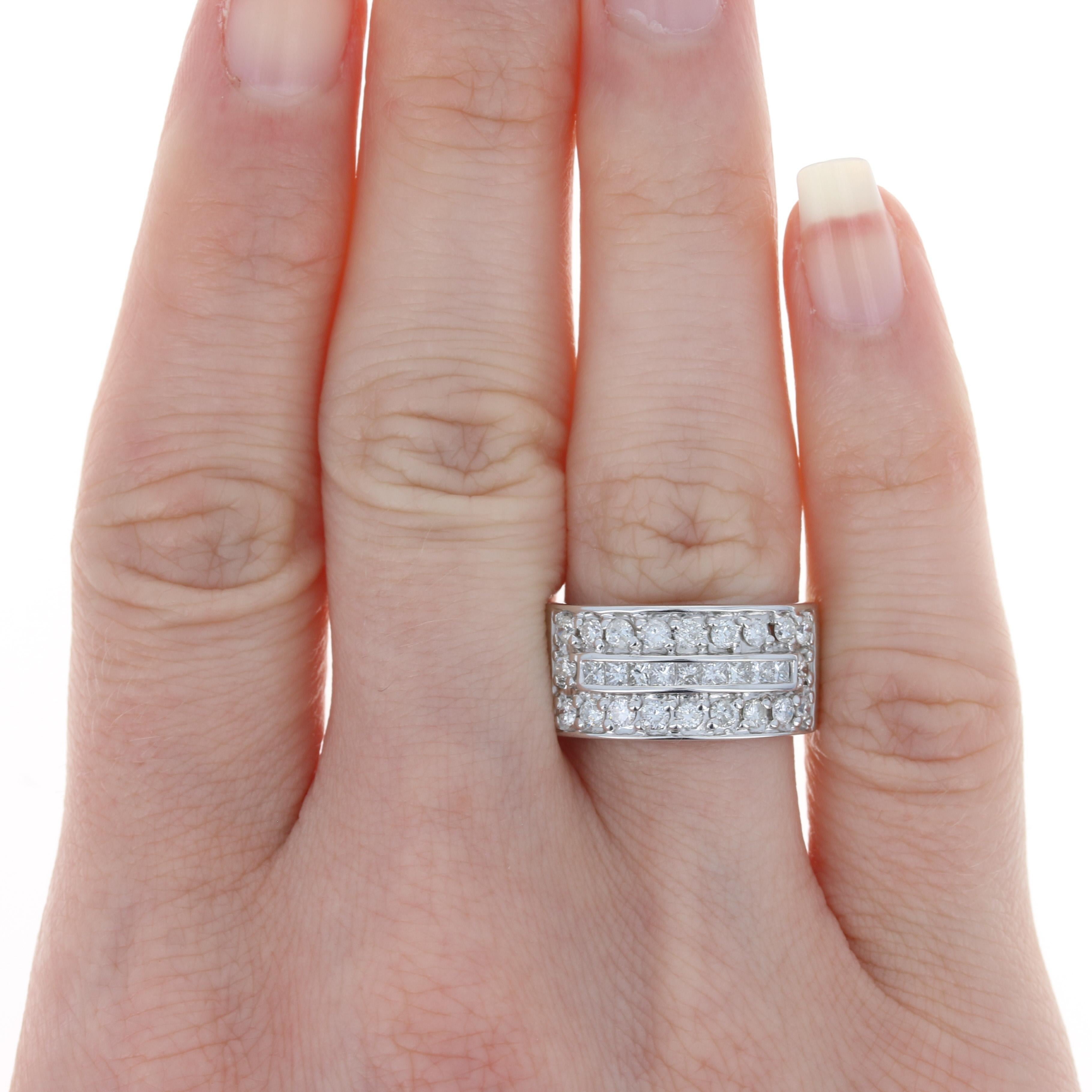 Size: 6 3/4

Metal Content: 14k White Gold

Stone Information: 
Natural Diamonds
Total Carats: 1.20ctw
Cuts: Princess & Round Brilliant
Color: G - H
Clarity: SI2 - I1

Style: Band

Face Height (north to south): 13/32