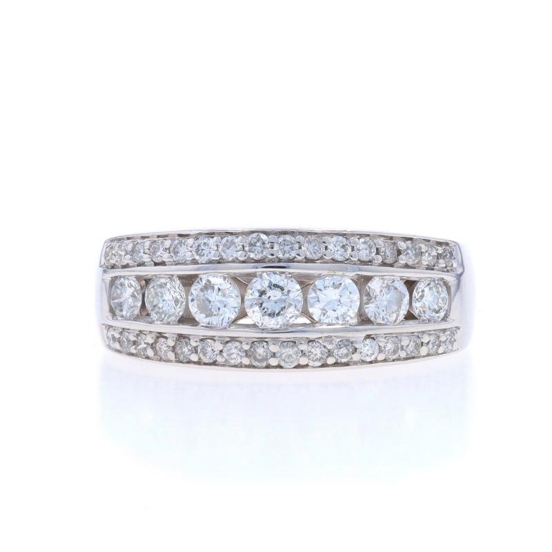 Size: 7

Metal Content: 14k White Gold

Stone Information

Natural Diamonds
Carat(s): 1.00ctw
Cut: Round Brilliant
Color: G - H
Clarity: SI2 - I1

Total Carats: 1.00ctw

Style: Seven-Stone with Accents Band

Measurements

Face Height (north to
