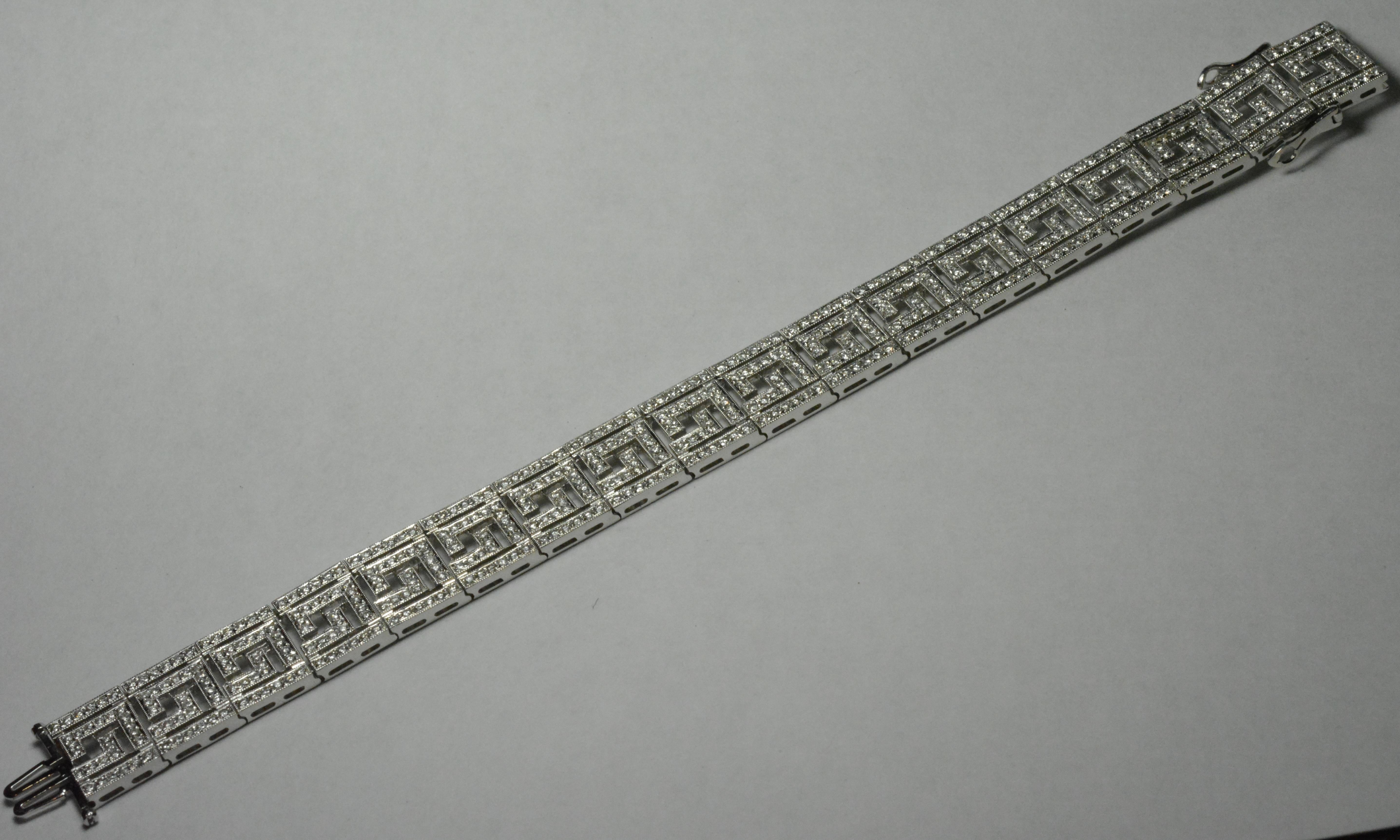 Ladies diamond bracelet in 18 karat white gold.
Stamped 750 and weighs 27.5 grams.
There are 5.00 total carats of round brilliant cut diamonds, F to G color, VS clarity, very good cuts.
The bracelet measures 6 3/4 inches long and 13.5mm wide.
Very