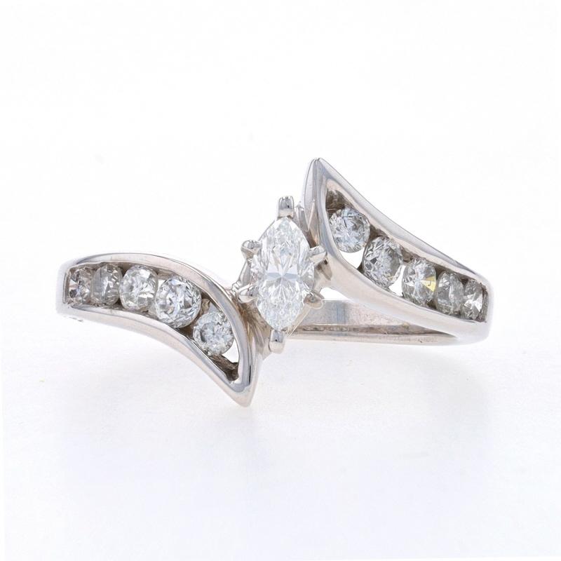Size: 7
Sizing Fee: Up 2 sizes for $35 or Down 2 sizes for $30

Metal Content: 14k White Gold

Stone Information

Natural Diamond
Carat(s): .18ct
Cut: Marquise
Color: H
Clarity: SI1

Natural Diamonds
Carat(s): .40ctw
Cut: Round Brilliant
Color: G -