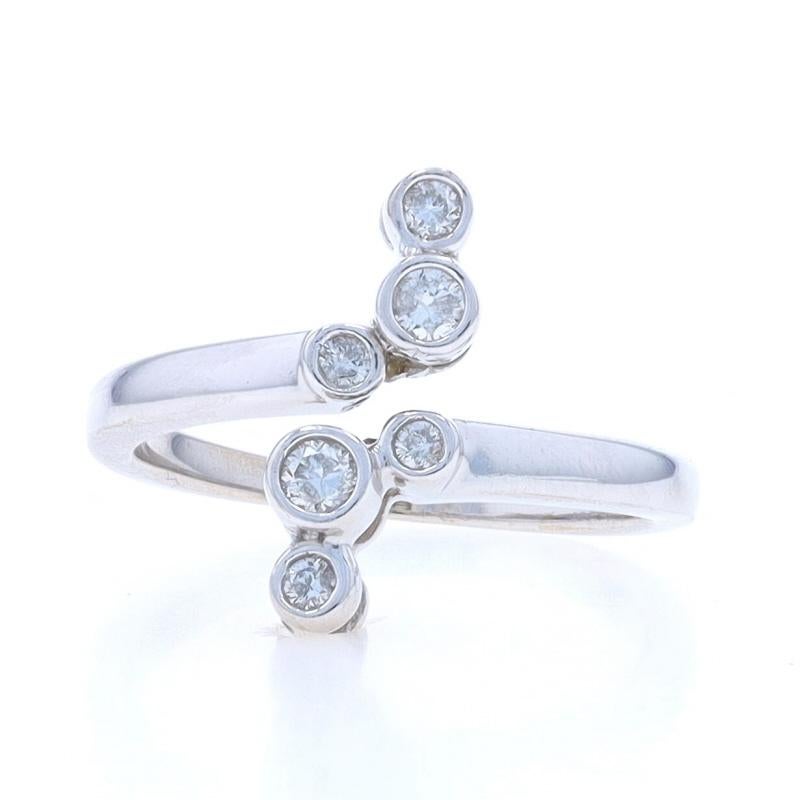 Size: 7 1/2

Note: Slightly Manually Adjustable

Metal Content: 14k White Gold

Stone Information

Natural Diamonds
Carat(s): .30ctw
Cut: Round Brilliant
Color: H - I
Clarity: I1

Total Carats: .30ctw

Style: Bypass
Theme: Love