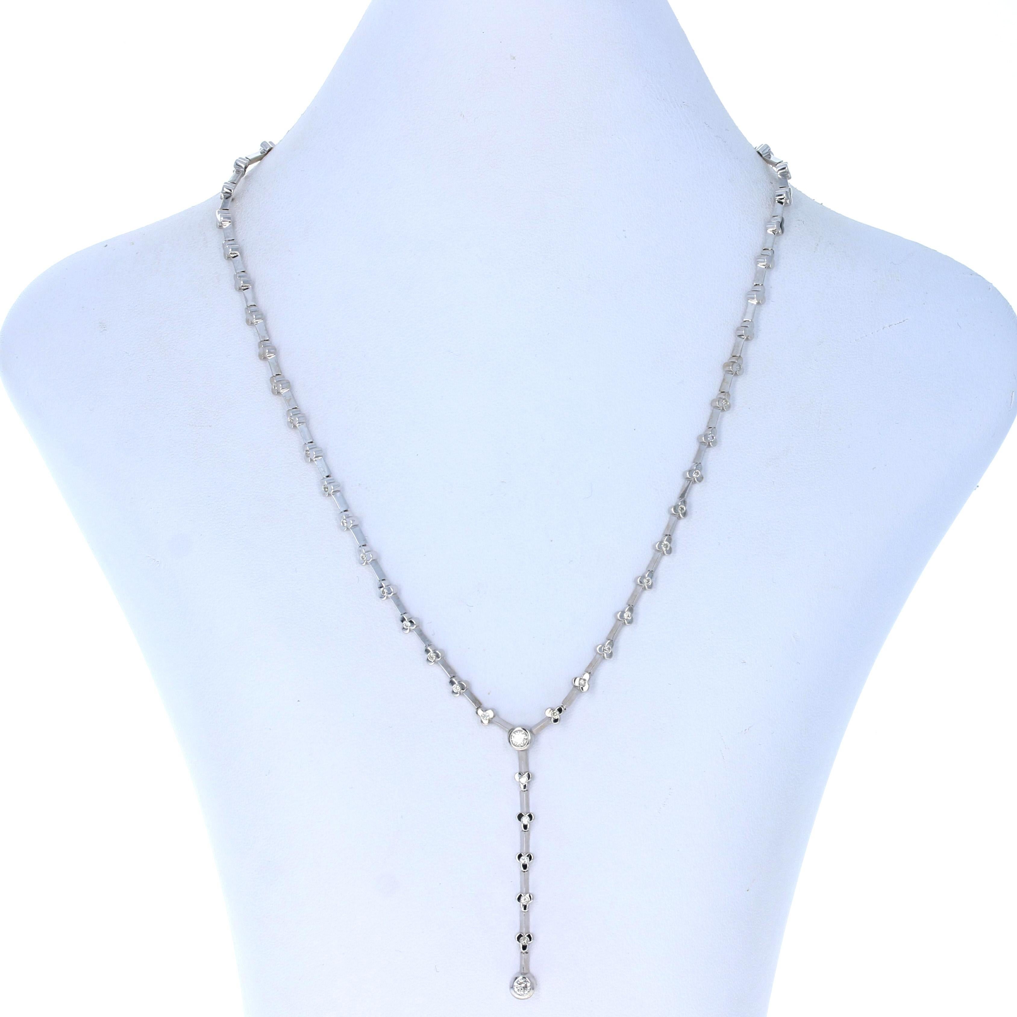 Metal Content: 18k White Gold  

Stone Information: 
Natural Diamonds
Total Carats: .75ctw
Cut: Round Brilliant 
Color: I - J   
Clarity: VS1 - VS2 

Necklace Style: Lariat 
Chain Style: Fancy Link
Closure Type: Tab Box Clasp with Side Safety