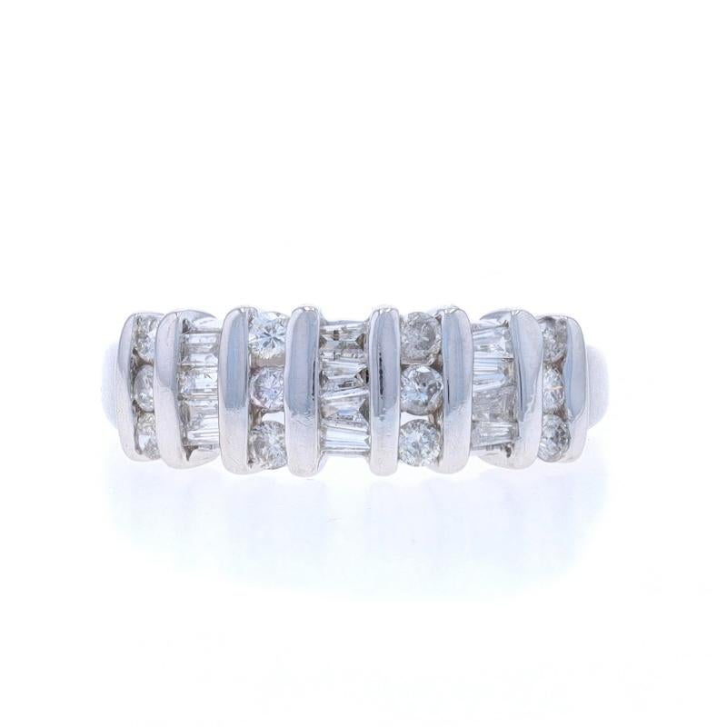 Size: 5

Metal Content: 14k White Gold

Stone Information

Natural Diamonds
Carat(s): .50ctw
Cut: Round Brilliant & Baguette
Color: G - H
Clarity: I1 - I2

Total Carats: .50ctw

Style: Cluster Cocktail Band
Features: Channel Set