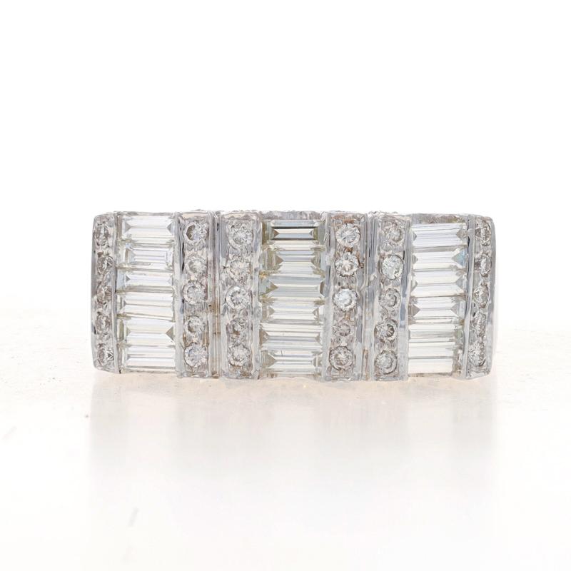Size: 7

Metal Content: 18k White Gold

Stone Information
Natural Diamonds
Carat(s): 2.00ctw
Cut: Baguette & Round Brilliant
Color: H - I
Clarity: VS1 - VS2

Total Carats: 2.00ctw

Style: Cluster Cocktail Band
Features: Diamond-Accented