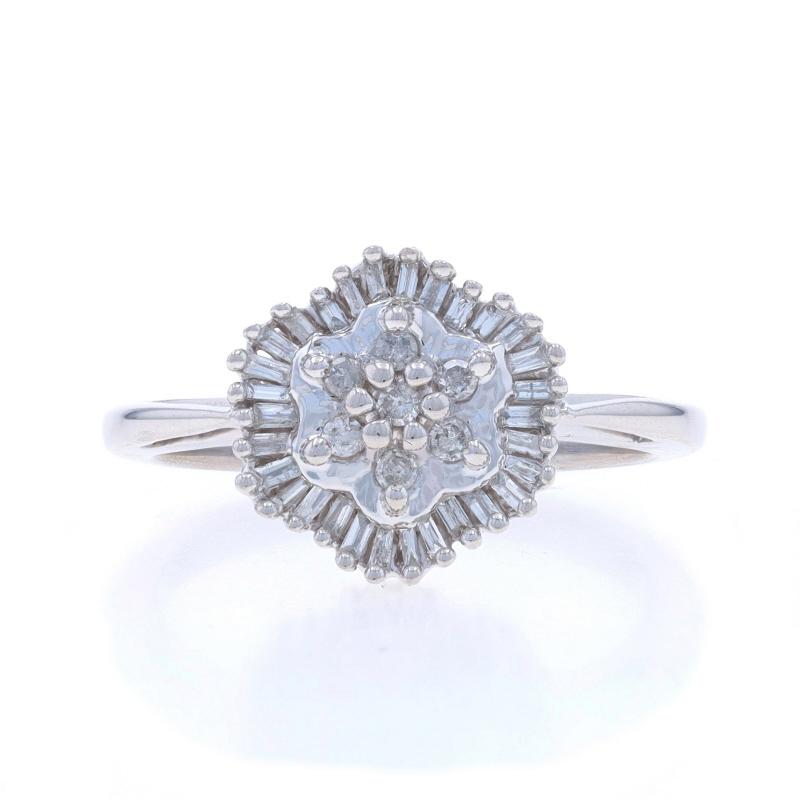 Size: 7
Sizing Fee: Up 2 1/2 sizes for $35 or Down 1 size for $35

Metal Content: 14k White Gold

Stone Information

Natural Diamonds
Carat(s): 1/4ctw
Cut: Single & Baguette
Color: G - H
Clarity: I1 - I2

Total Carats: 1/4ctw

Style: Cluster