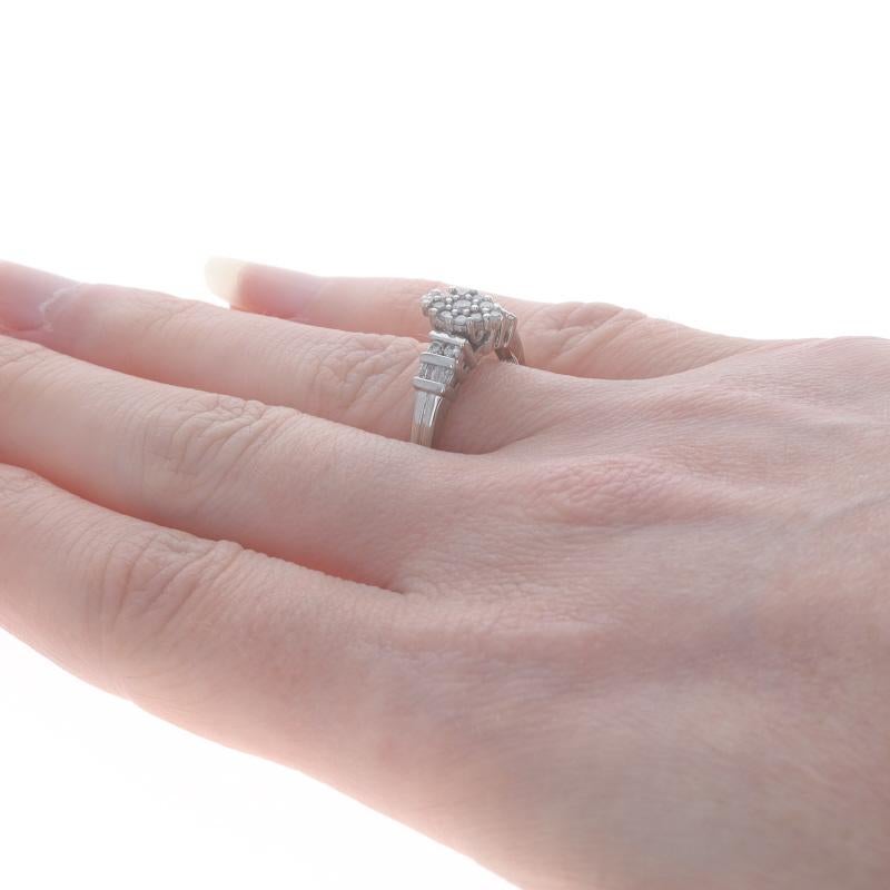 White Gold Diamond Cluster Engagement Ring - 10k Round & Baguette .50ctw In Excellent Condition For Sale In Greensboro, NC