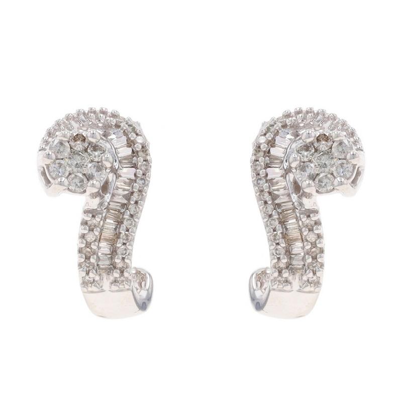 Metal Content: 10k White Gold

Stone Information

Natural Diamonds
Carat(s): .50ctw
Cut: Round Brilliant & Baguette
Color: Champagne Brown
Clarity: SI2 - I1

Total Carats: .50ctw

Style: Cluster J-Hook
Fastening Type: Butterfly Closures
Theme: