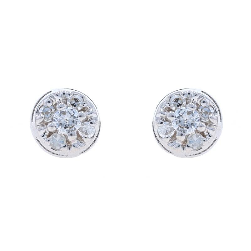 Metal Content: 14k White Gold

Stone Information

Natural Diamonds
Carat(s): .28ctw
Cut: Round Brilliant (centers) & Single
Color: G - H
Clarity: SI2 - I1

Total Carats: .28ctw

Style: Cluster Stud
Fastening Type: Pierced Screw-On