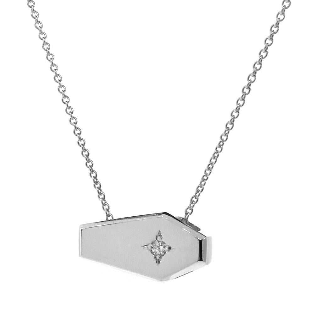 our unique White Gold Diamond Coffin Pendant, is crafted from solid 9k White Gold and a natural White star set Diamond., and hangs from a dianty 45cm 9k white gold cable chain, This exquisite piece captures a timeless sentiment of mortality, a