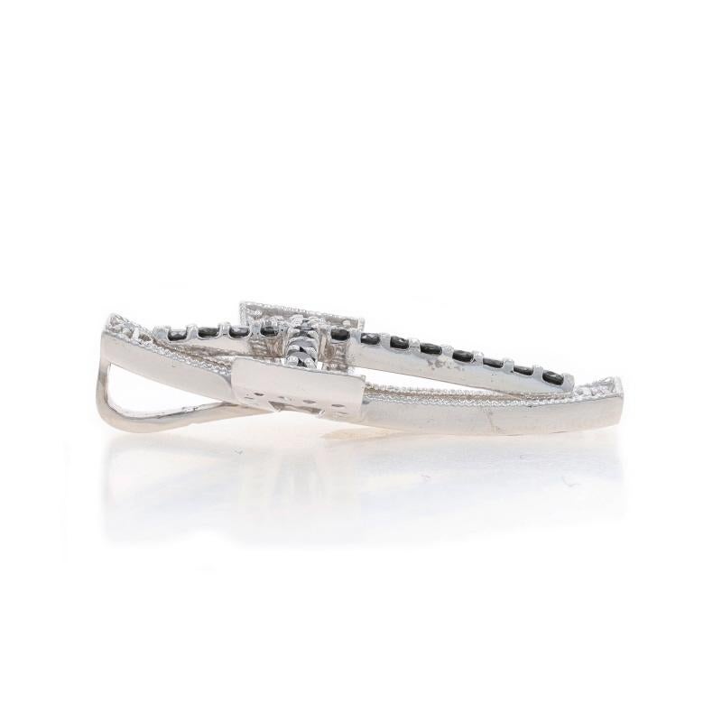 Metal Content: 14k White Gold

Stone Information

Natural Diamonds
Treatment: Color Enhanced
Carat(s): .50ctw
Cut: Round Brilliant
Color: Black and H - I
Clarity: SI1 - SI2

Total Carats: .50ctw

Theme: Cross
Features: Milgrain

Measurements

Tall: