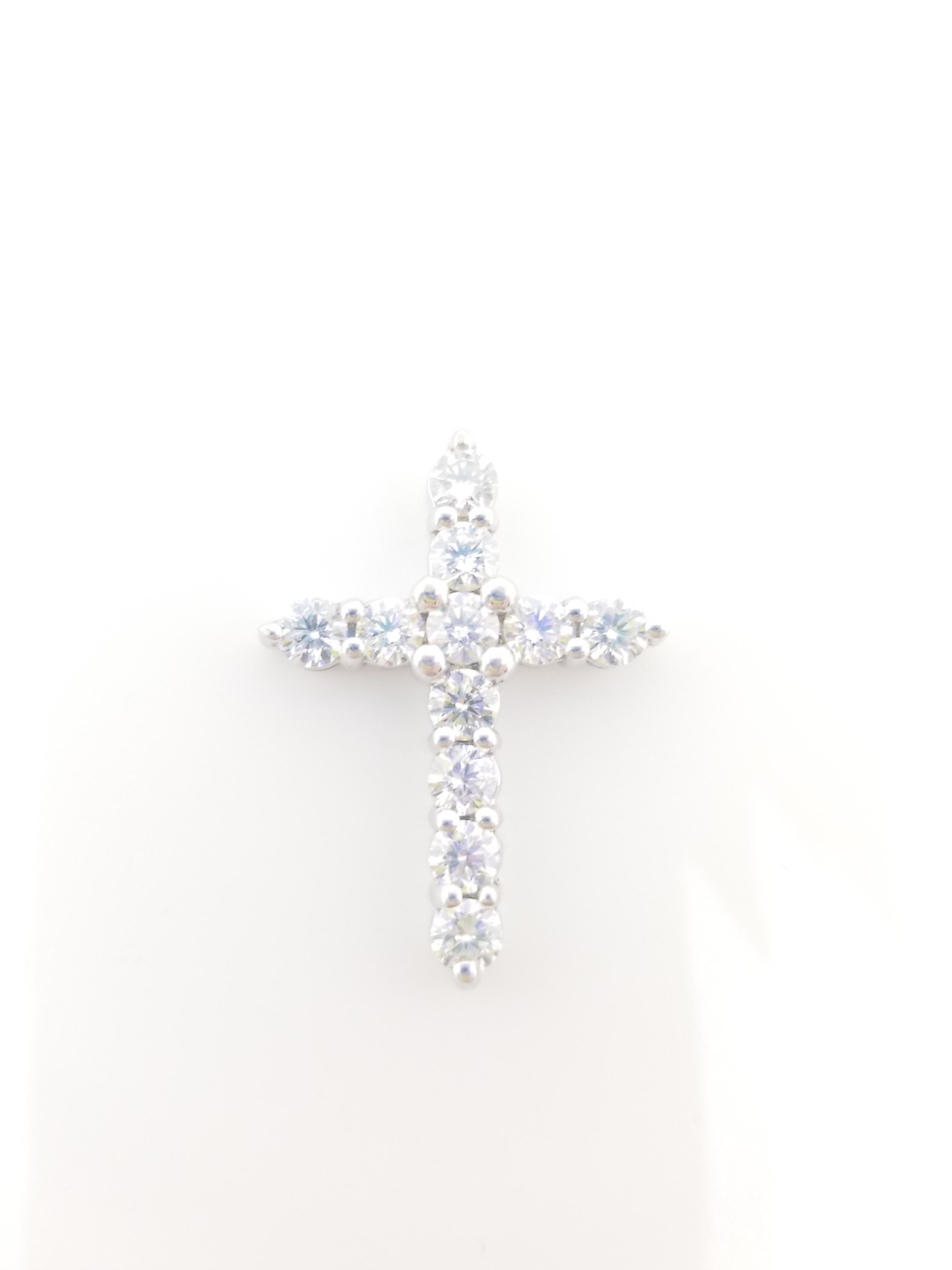 Beautiful 14K white gold and diamond cross pendant. A total weight of 2.12CTS round cut diamonds very sparkly and shiny look.