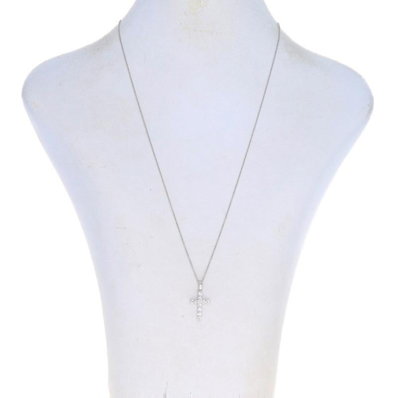 Metal Content: 14k White Gold

Stone Information
Natural Diamonds
Carat(s): .50ctw
Cut: Round Brilliant
Color: G
Clarity: SI1

Total Carats: .50ctw

Chain Style: Cable
Necklace Style: Chain
Fastening Type: Spring Ring Clasp
Theme: Cross,