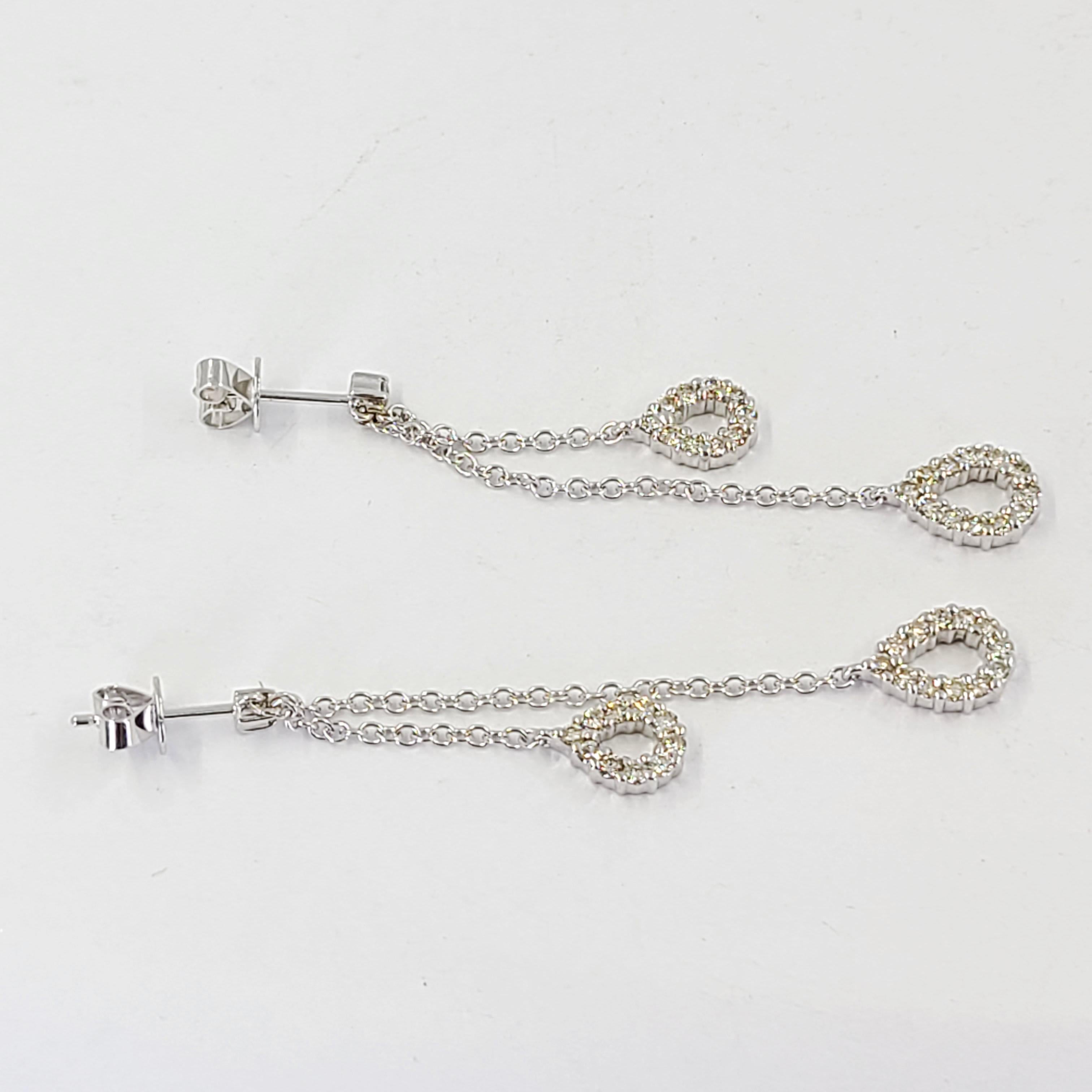 Round Cut White Gold Diamond Dangle Earrings For Sale