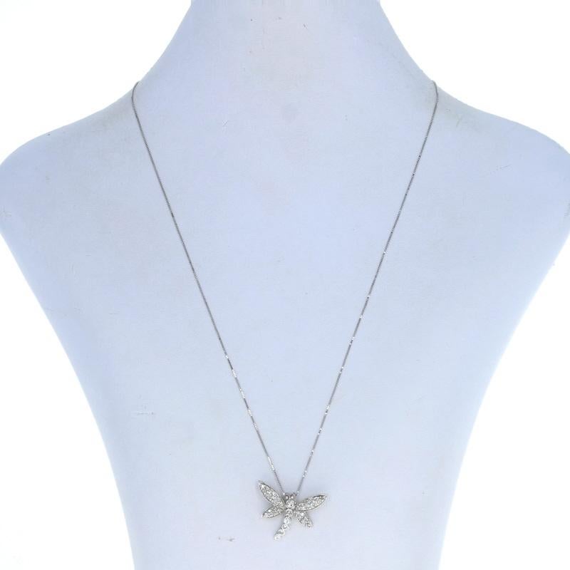 Metal Content: 14k White Gold

Stone Information
Natural Diamonds
Total Carats: .54ctw
Cut: Round Brilliant
Color: G - H
Clarity: SI2 - I1

Chain Style: Box
Fastening Type: Spring Ring Clasp
Theme: Dragonfly, Nature

Pendant Measurements
Tall: