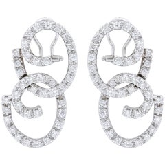 Boucles d'oreilles or blanc et diamants