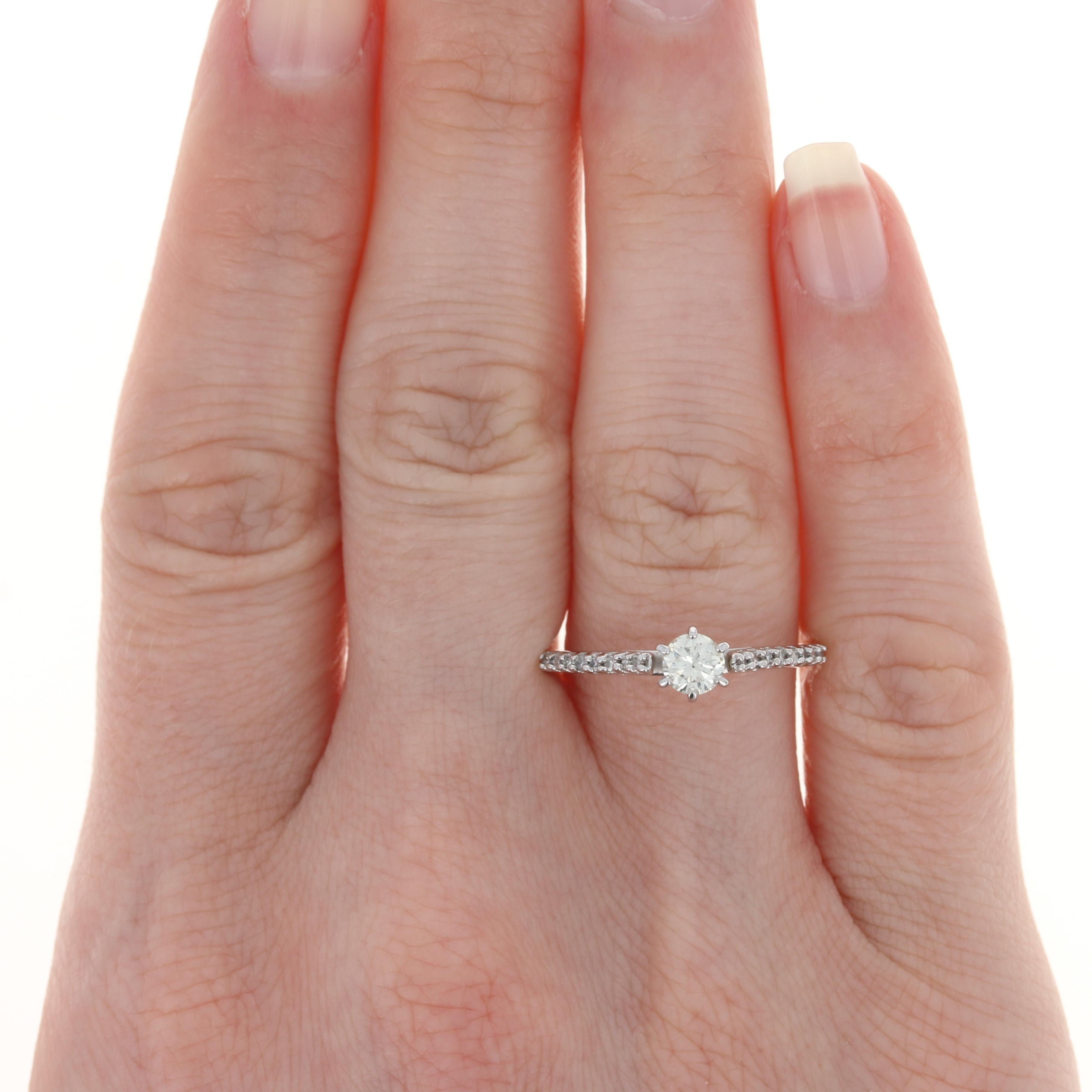 Size: 8
Sizing Fee: Up 2 sizes for $25 or down 2 sizes for $20

Metal Content: 10k White Gold 

Stone Information: 
Natural Diamond (solitaire)
Carat: .35ct
Cut: Round Brilliant 
Color: N
Clarity: SI2
Diameter: 4.4mm 

Natural Diamonds