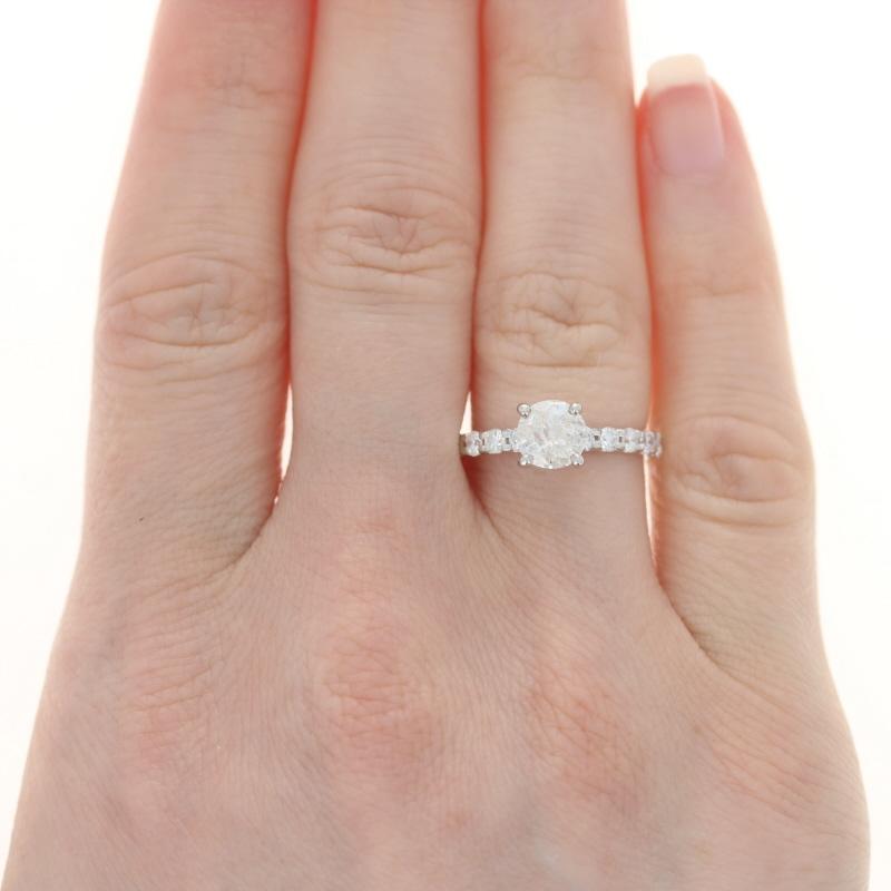 Size: 6 1/4
Sizing Fee: Up 2 for $35

Metal Content: 14k White Gold

Stone Information

Natural  Diamond
Carat(s): 1.02ct (weighed)
Cut: Round Brilliant
Color: I
Clarity: I2
Stone Note: (solitaire)

Natural Diamonds
Carat(s): .80ctw
Cut: Round