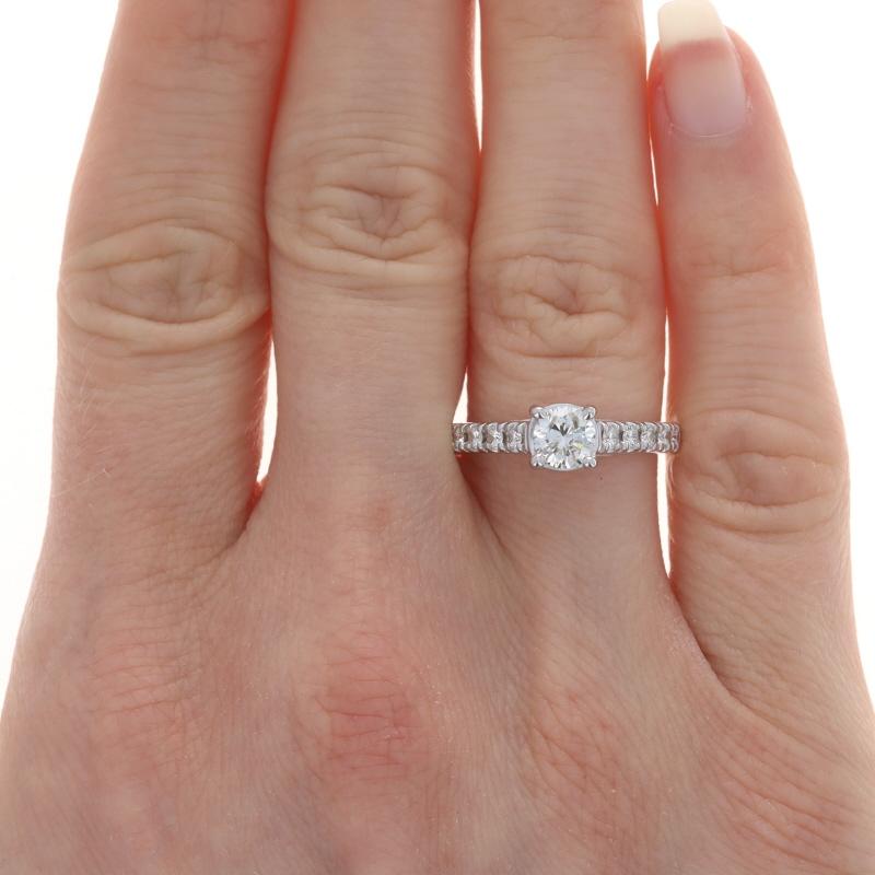 Size: 6 1/2
Sizing Fee: Up 2 sizes for $40 or Down 1 size for $35

Metal Content: 14k White Gold

Stone Information

Natural Diamond
Carat(s): .55ct
Cut: Round Brilliant
Color: I
Clarity: I1

Natural Diamonds
Carat(s): .30ctw
Cut: Round