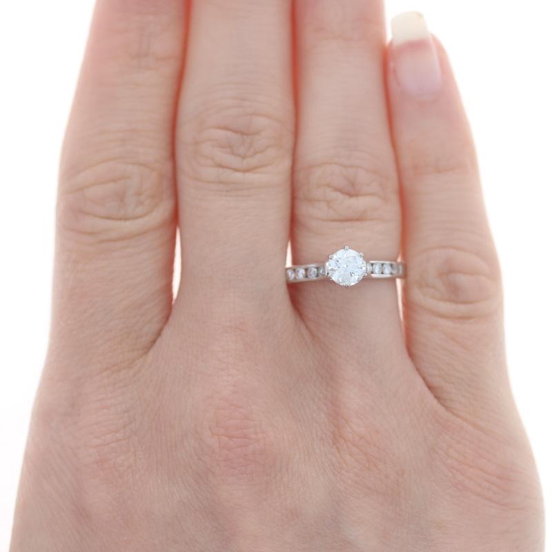 Size: 6 1/4
Sizing Fee: Down 1 size for $70 or up 2 size for $80

Metal Content: 18k White Gold

Stone Information
Natural Diamond
Carat(s): .56ct
Cut: Round Brilliant 
Color: G
Clarity: I2
Stone Note: (solitaire)
Certified by: GIA
Report Number:
