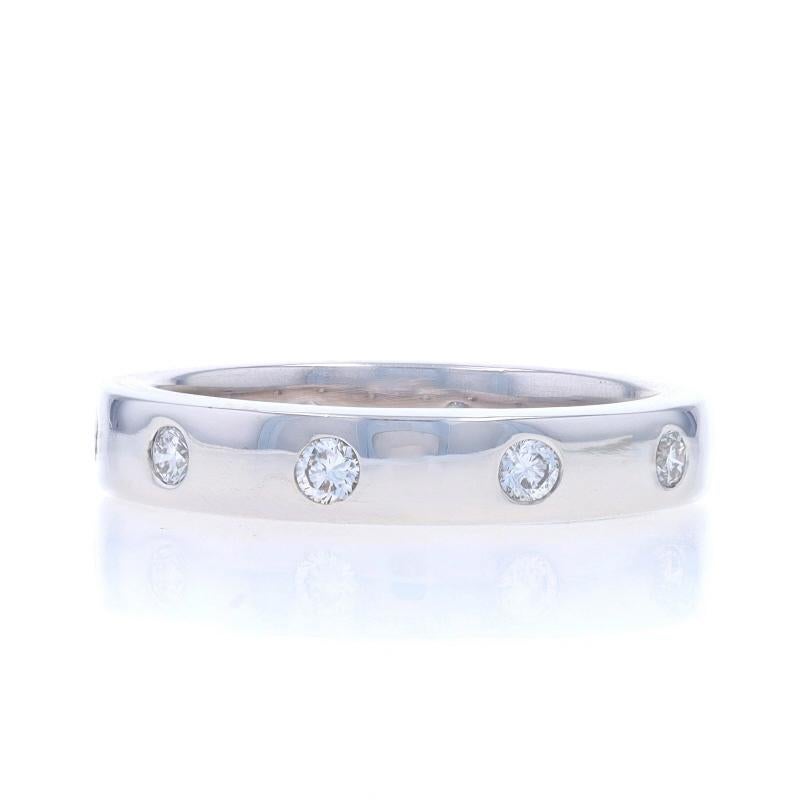 Size: 5 3/4

Metal Content: 14k White Gold

Stone Information
Natural Diamonds
Carat(s): .26ctw
Cut: Round Brilliant
Color: H - I
Clarity: VS2 - SI1

Total Carats: .26ctw

Style: Eternity Band

Measurements
Face Height (north to south): 5/32