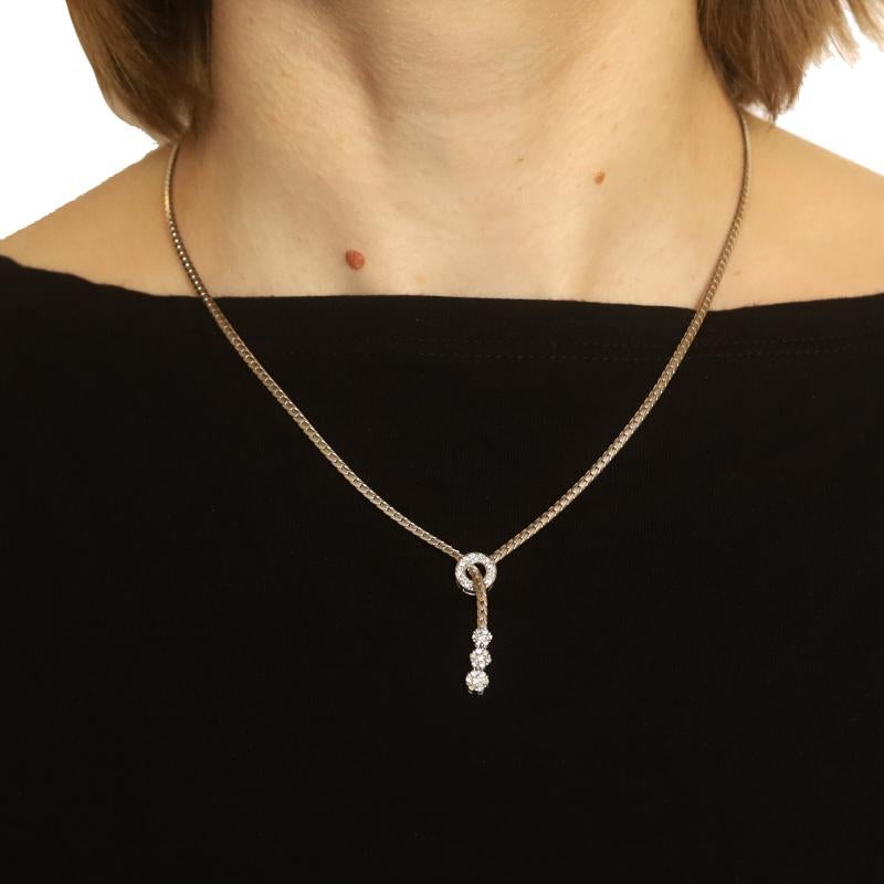 Metal Content: 14k White Gold

Stone Information

Natural Diamonds
Carat(s): .40ctw
Cut: Round Brilliant
Color: G - H
Clarity: SI2 - I1

Total Carats: .40ctw

Style: Eternity Journey Lariat
Chain Style: Herringbone
Necklace Style: Chain
Fastening