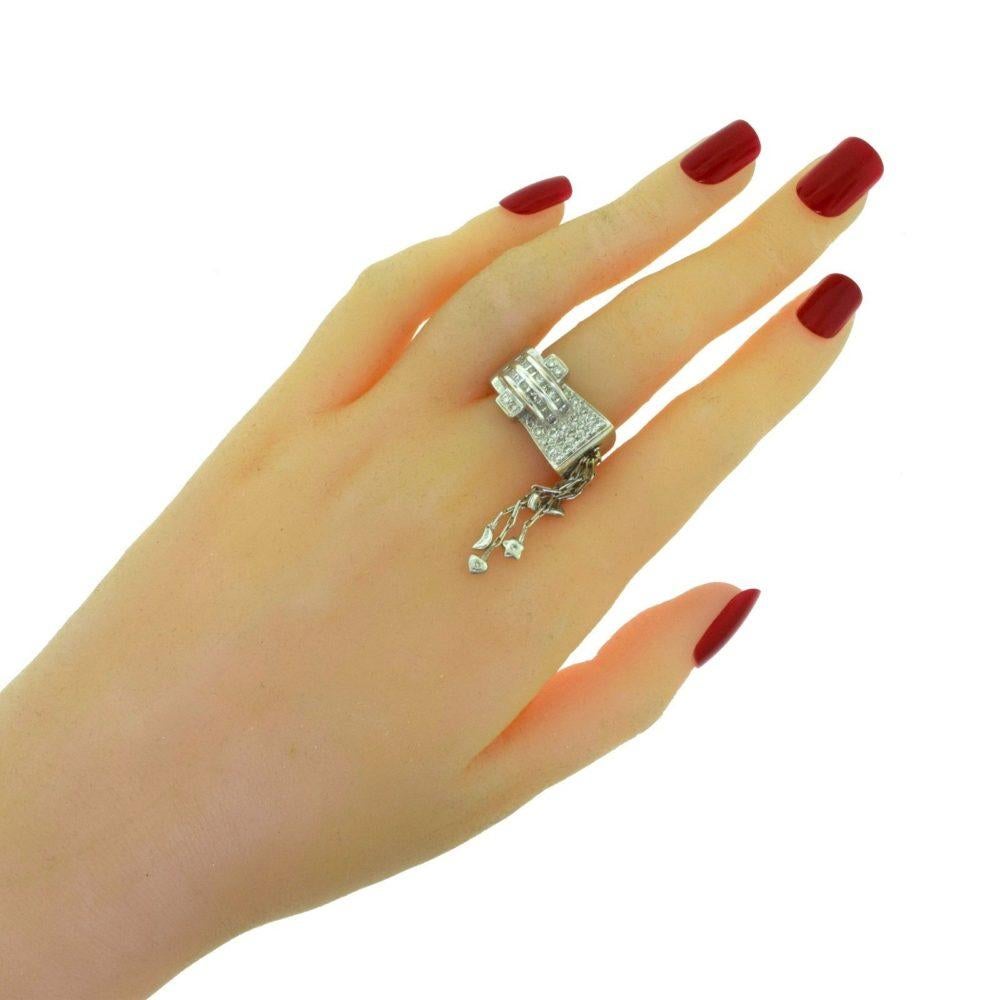 Ring Size: 6.75 - 7 (sizable)

Metal: White Gold

Metal Purity: 18k

​​​​​​​Stones: 49 Brilliant Round Diamonds

​​​​​​​Diamond Color: G - H

​​​​​​​Diamond Clarity: VS - SI

​​​​​​​Total Carat Weight: 1.5 ct

​​​​​​​Total Item Weight (g):