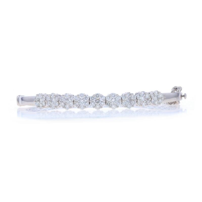 Metal Content: 14k White Gold

Stone Information

Natural Diamonds
Carat(s): 2.00ctw
Cut: Round Brilliant
Color: G - H
Clarity: SI2 - I1

Total Carats: 2.00ctw

Style: Bangle
Fastening Type: Tab Box Clasp with Fold-Under Safety Clasp & Safety