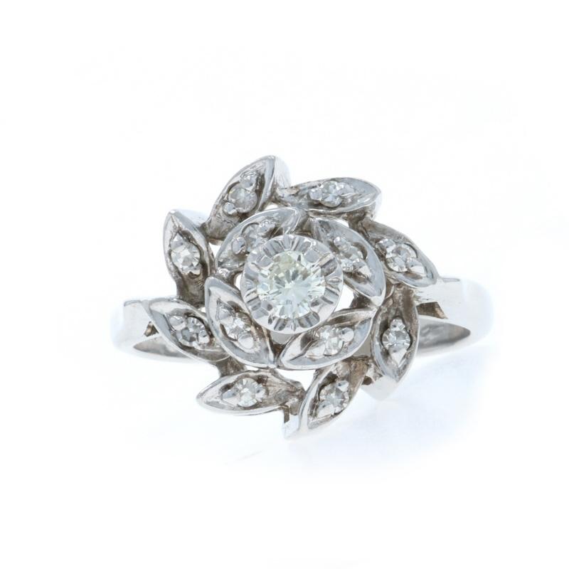Size: 5 3/4
Sizing Fee: Up 3 sizes for $40 or Down 2 sizes for $40

Metal Content: 14k White Gold

Stone Information

Natural Diamonds
Carat(s): .28ctw
Cut: Round Brialliant (center) & Single (accents)
Color: H - I
Clarity: VS2 - SI1

Total Carats: